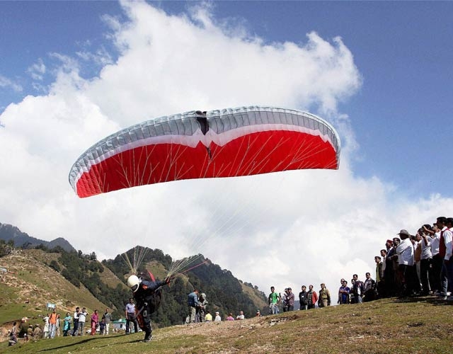  Top 5 adventure sports in India 
 India is gradually becoming a favoured adventure sports destination in the world...
1. Paragliding

Paragliding is a relatively new sport in India. The major paragliding sites in India are Billing, Kullu, Solang, Lahaul &amp; Spiti(all in Himachal), Naukutchiyatal, Dayara Bugyal, Dhanolti Ridge, Bedni Bugyal (all in Uttarakhand), Jaipur, Jaisalmer, Jodhpur, Udaipur, Bikaner (all in Rajasthan), Matheran, Deolali, Mahabaleshwar (all in Maharashtra). The flying season spans September to December and then March to June. Photo: PTI
2. Skiing
Skiing is a big craze worldwide. Gulmarg in Kashmir offers one of the largest facilities for this winter sport. The best part is that the snow conditions remain excellent from December to April. Meanwhile, the slopes in Garhwal and Kumaon are also ideal place for skiing in the winter months. Auli in Garhwal is currently rated as one of India’s best skiing resort. Other places which can be ski lovers delight are Kufri, Narkanda, Manali, Mundali, Munsiyari and Dayara Bugyal. Photo: Getty Images
3. Rock Climbing