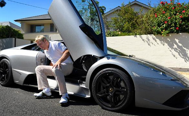 Shane Warne in his Lamborghini Murcielago