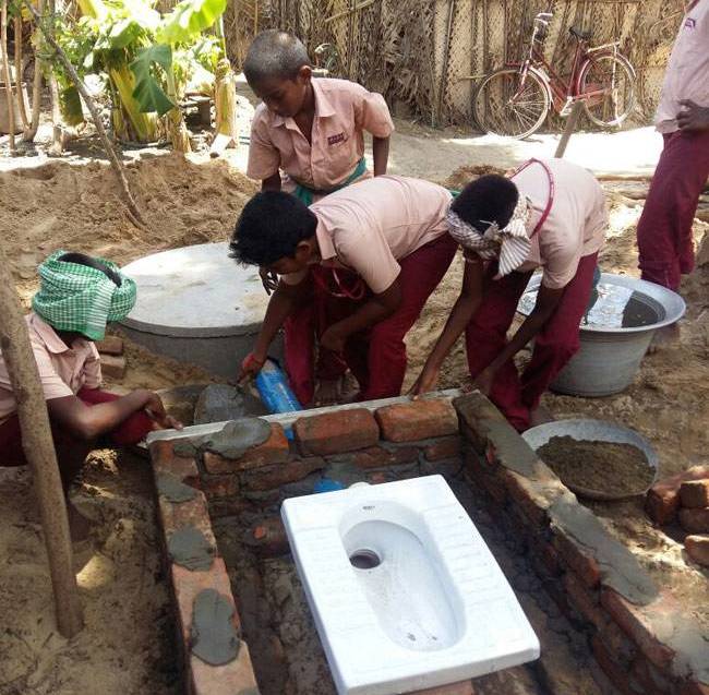 In A Heartwarming Gesture, Four Classmates Join Hands To Build A Toilet