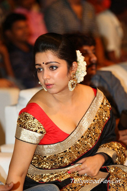 1442671437-charmi-dancing-photos-at-jyothi-lakshmi-audio-tollywoodfansin-55fd6b402413f.jpg